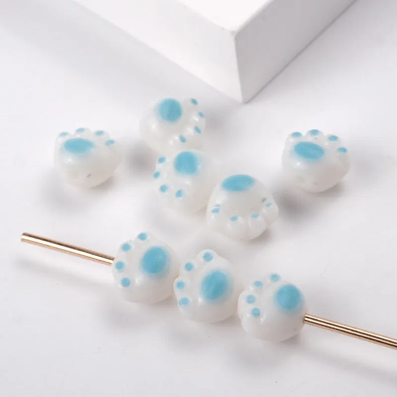 Wholesale 100PCS/PACK Cartoon Cute Three-dimensional Cat Claw Straight Hole Acrylic String Beads